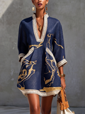 COSETTE | Abito mini in pizzo all'uncinetto blu marino con motivi dorati e scollo a V